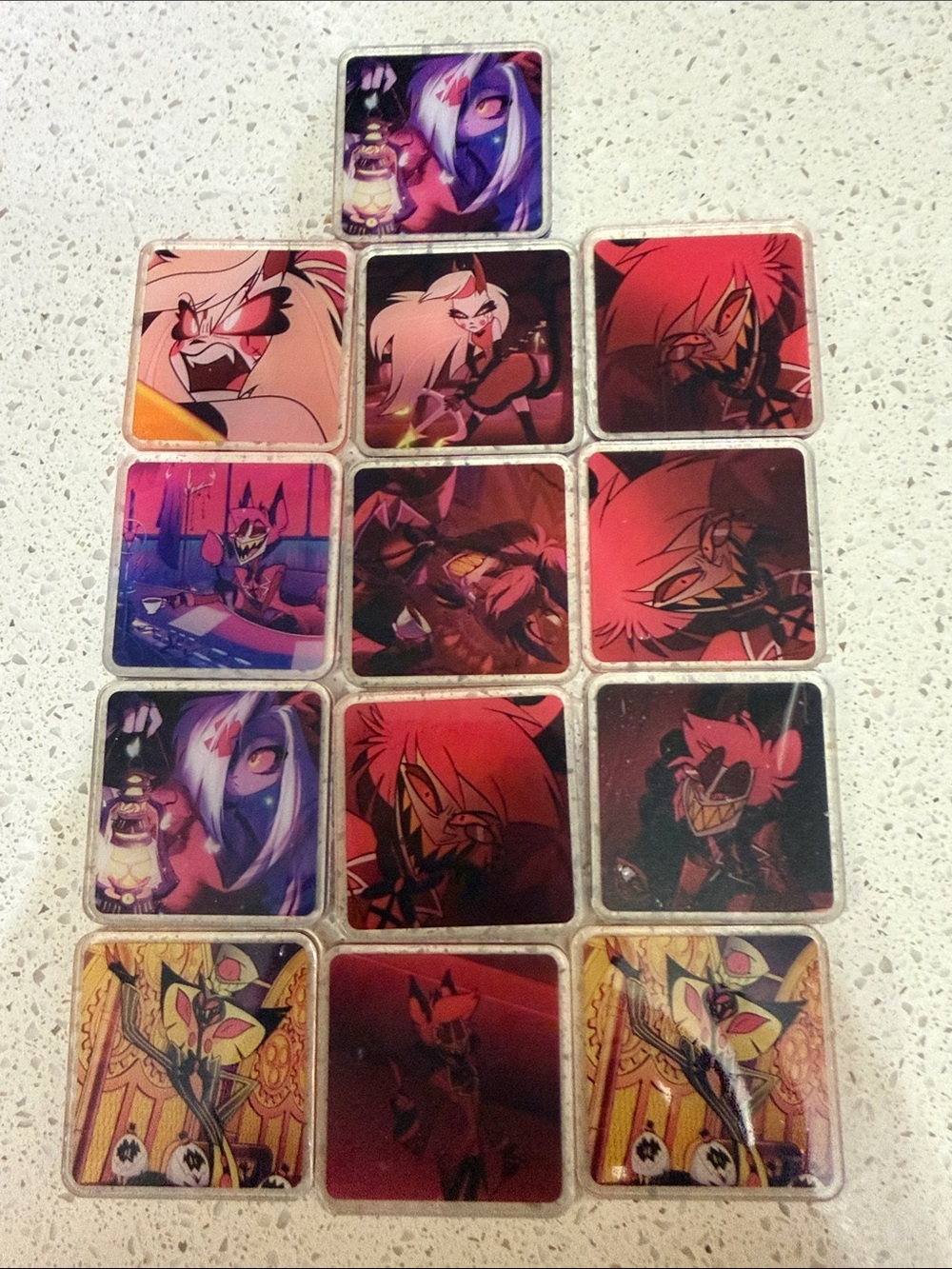 Set of 13 Hazbin Hotel Anime Acrylic charms.